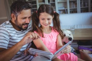 Father & daughter with dog