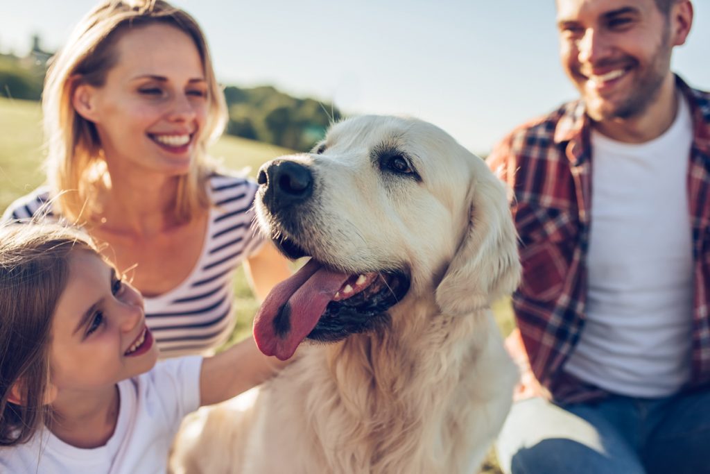 Family with white dog