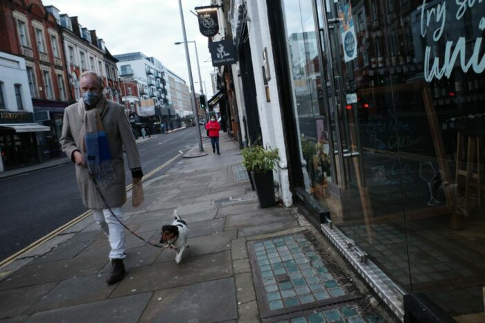 Man walking dog on lead